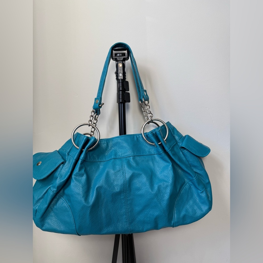 Vintage Turquoise Leather shoulder Bag with silver accent.